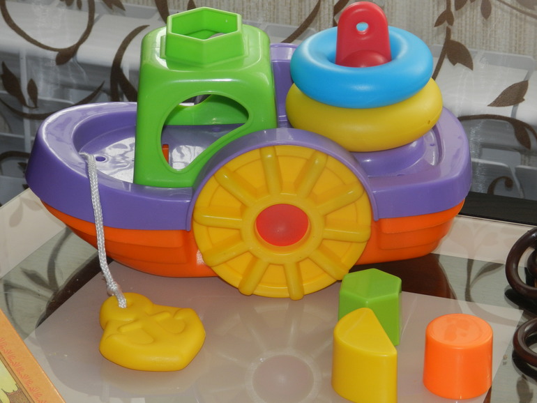 Наш сортер-каталка..и игрушка для ванны пирамида 4 в  1