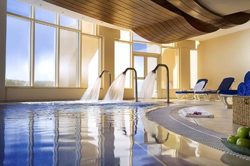 ОАЭ. Golden Tulip Khatt Springs Resort & Spa 5*