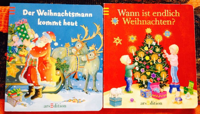 Новогодние книги с окошками на немецком