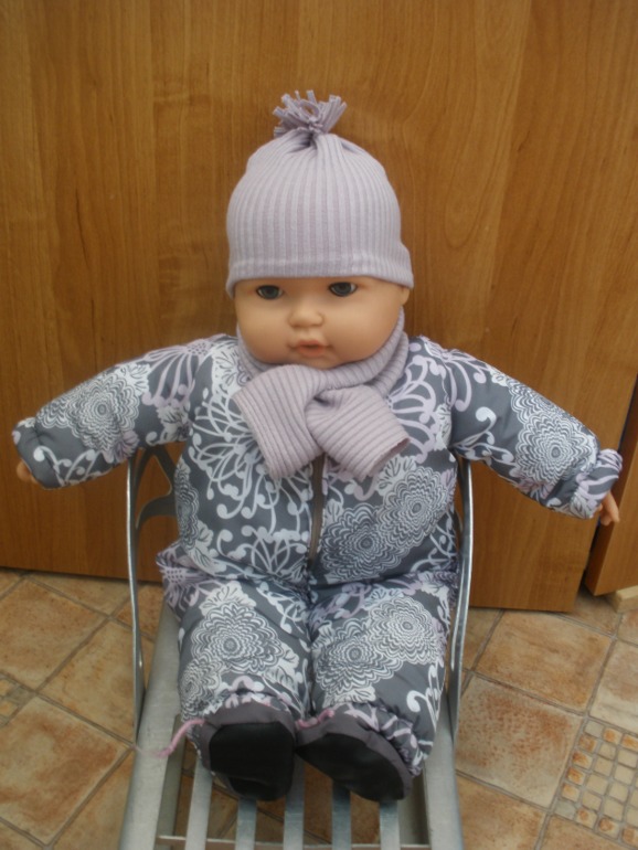 И куколку приодели