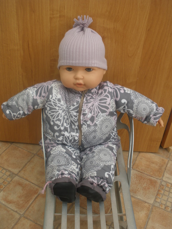 И куколку приодели