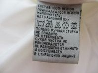 Новый белоснежный пуховик 44-46