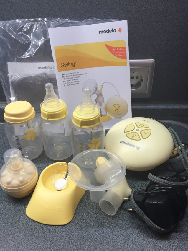 Молокоотсос Medela swing