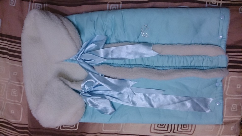 Меховой конверт на выписку