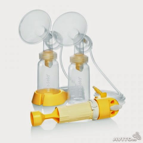 Молокоотсос Medela Lactina