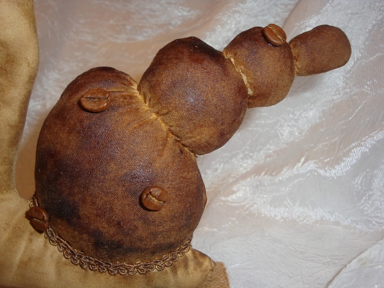 Моя первая тильда: кофейная улитка с глазами-перископами на скейте.