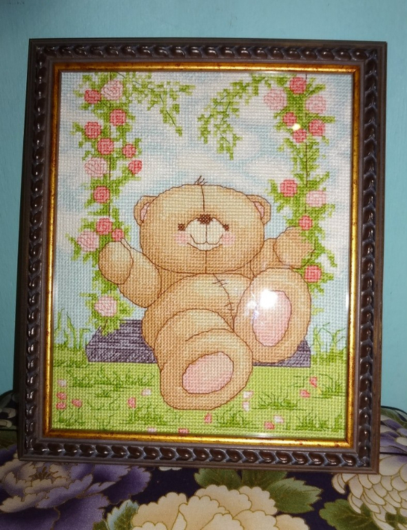 Мишка на качелях