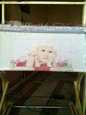 Процесс вышивки портрета внучки