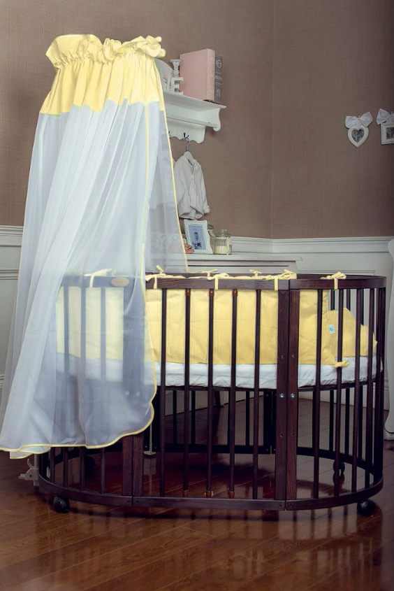 КРОВАТКА- ТРАНСФОРМЕР "COMFORT BABY" .Цена: 25 000 руб.  ХАРАКТЕРИСТИКИ:  возраст детей: 0-5 лет  габариты модели (Д х Ш х В): 1) колыбельки: 78*76*81 см  2) овальной кроватки: 128*76*81 cм  матрас приобретается отдельно.  максимальная нагрузка: 120 кг  Материал: изготавливается только из настоящего массива бука высшего сорта.  сборка: кровать в разобранном виде, простота сборки, инструкция по сборке на русском языке  продукция сертифицирована  производство: Россия  гарантия: 2 года   Дополнительные характеристики: 4 положения по высоте (расстояние положения дна от пола без колес: 1см, 12см, 37см, 57см; расстояние между отверстиями снизу-наверх: 12см, 15см, 20см.); 3 прутика - съемные.  КОНМПЛЕКТАЦИЯ:  1-я ступень - круглая кроватка  2-я ступень - овальная кроватка  3-я ступень - диванчик  4-я ступень - манеж  5-я и 6-я ступени - 2 кресла и столик  7-я ступень - пеленальный столик  ДОПОЛНИТЕЛЬНЫЕ ОПЦИИ:  Комплект постельный "Classic" +6950 руб.  Комплект постельный "Colorit" + 11990 руб.  Фирменный держатель для балдахина +790 руб.  Комплект цельных матрасов " Холкон"/ "Кокос" (круглый+овальный) +8490 руб  Маятник "ComfortBaby Pendulum" 2 в 1+6990 руб.
