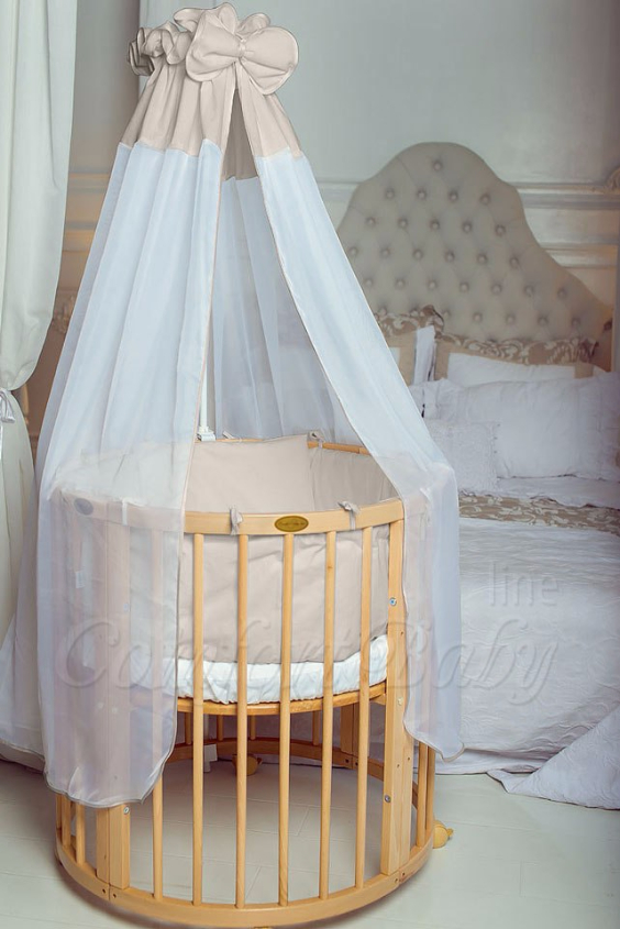 КРОВАТКА- ТРАНСФОРМЕР "COMFORT BABY" .Цена: 25 000 руб.  ХАРАКТЕРИСТИКИ:  возраст детей: 0-5 лет  габариты модели (Д х Ш х В): 1) колыбельки: 78*76*81 см  2) овальной кроватки: 128*76*81 cм  матрас приобретается отдельно.  максимальная нагрузка: 120 кг  Материал: изготавливается только из настоящего массива бука высшего сорта.  сборка: кровать в разобранном виде, простота сборки, инструкция по сборке на русском языке  продукция сертифицирована  производство: Россия  гарантия: 2 года   Дополнительные характеристики: 4 положения по высоте (расстояние положения дна от пола без колес: 1см, 12см, 37см, 57см; расстояние между отверстиями снизу-наверх: 12см, 15см, 20см.); 3 прутика - съемные.  КОНМПЛЕКТАЦИЯ:  1-я ступень - круглая кроватка  2-я ступень - овальная кроватка  3-я ступень - диванчик  4-я ступень - манеж  5-я и 6-я ступени - 2 кресла и столик  7-я ступень - пеленальный столик  ДОПОЛНИТЕЛЬНЫЕ ОПЦИИ:  Комплект постельный "Classic" +6950 руб.  Комплект постельный "Colorit" + 11990 руб.  Фирменный держатель для балдахина +790 руб.  Комплект цельных матрасов " Холкон"/ "Кокос" (круглый+овальный) +8490 руб  Маятник "ComfortBaby Pendulum" 2 в 1+6990 руб.