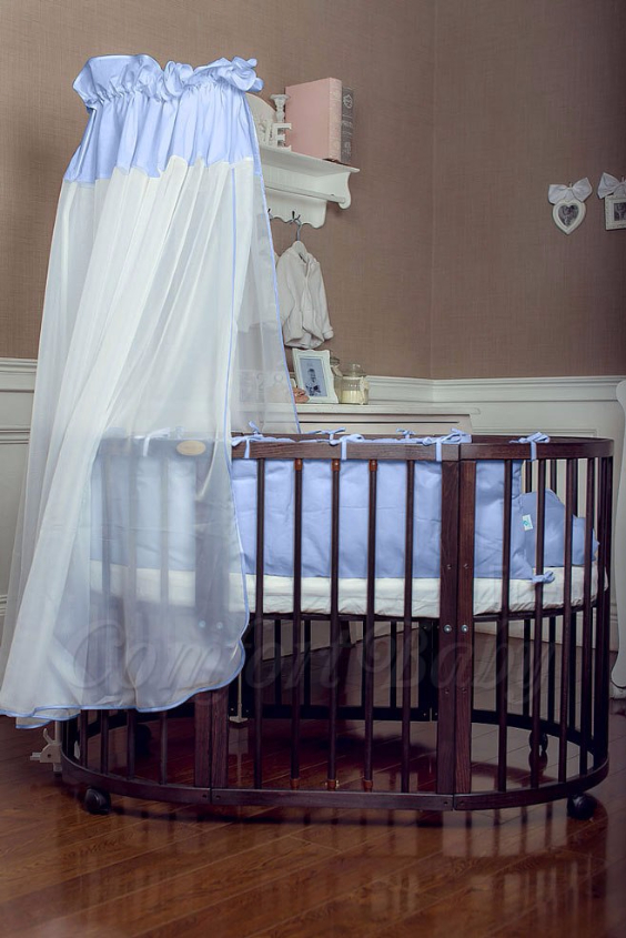 КРОВАТКА- ТРАНСФОРМЕР "COMFORT BABY" .Цена: 25 000 руб.  ХАРАКТЕРИСТИКИ:  возраст детей: 0-5 лет  габариты модели (Д х Ш х В): 1) колыбельки: 78*76*81 см  2) овальной кроватки: 128*76*81 cм  матрас приобретается отдельно.  максимальная нагрузка: 120 кг  Материал: изготавливается только из настоящего массива бука высшего сорта.  сборка: кровать в разобранном виде, простота сборки, инструкция по сборке на русском языке  продукция сертифицирована  производство: Россия  гарантия: 2 года   Дополнительные характеристики: 4 положения по высоте (расстояние положения дна от пола без колес: 1см, 12см, 37см, 57см; расстояние между отверстиями снизу-наверх: 12см, 15см, 20см.); 3 прутика - съемные.  КОНМПЛЕКТАЦИЯ:  1-я ступень - круглая кроватка  2-я ступень - овальная кроватка  3-я ступень - диванчик  4-я ступень - манеж  5-я и 6-я ступени - 2 кресла и столик  7-я ступень - пеленальный столик  ДОПОЛНИТЕЛЬНЫЕ ОПЦИИ:  Комплект постельный "Classic" +6950 руб.  Комплект постельный "Colorit" + 11990 руб.  Фирменный держатель для балдахина +790 руб.  Комплект цельных матрасов " Холкон"/ "Кокос" (круглый+овальный) +8490 руб  Маятник "ComfortBaby Pendulum" 2 в 1+6990 руб.
