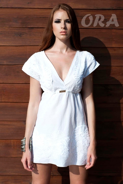 Огромный пристрой пляжной одежды O**R*A!