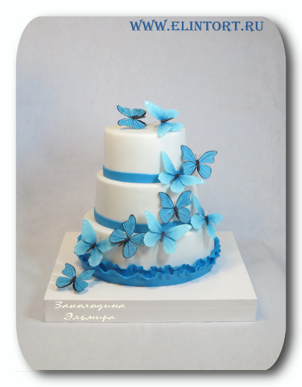 Свадебный в бело-синем с бабочками.